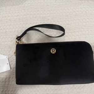 Velvet Lululemon Black Curved Wristlet with Gold Accents